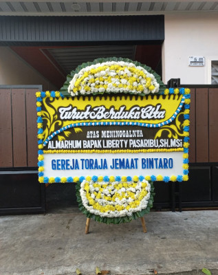 Papan Bunga Duka di Pisang